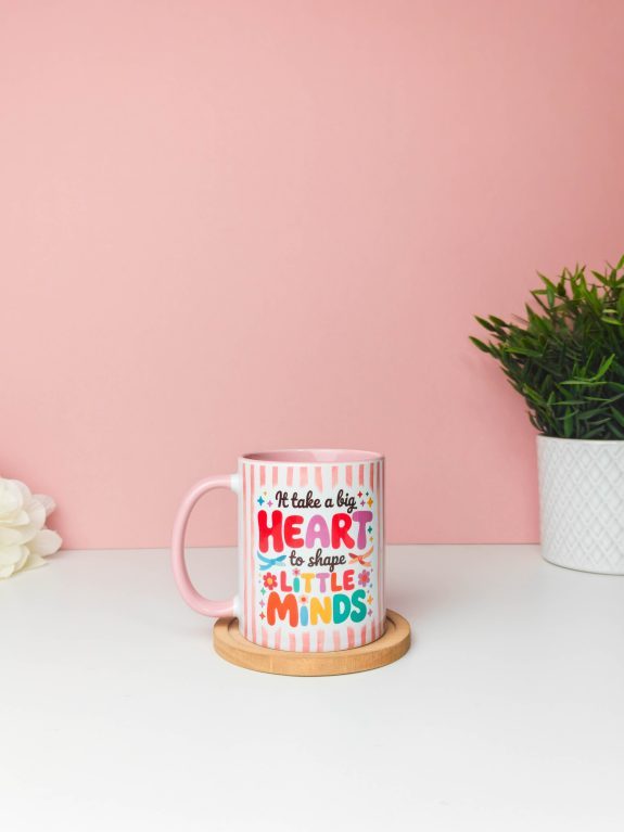 Teacher mug with a big heart message